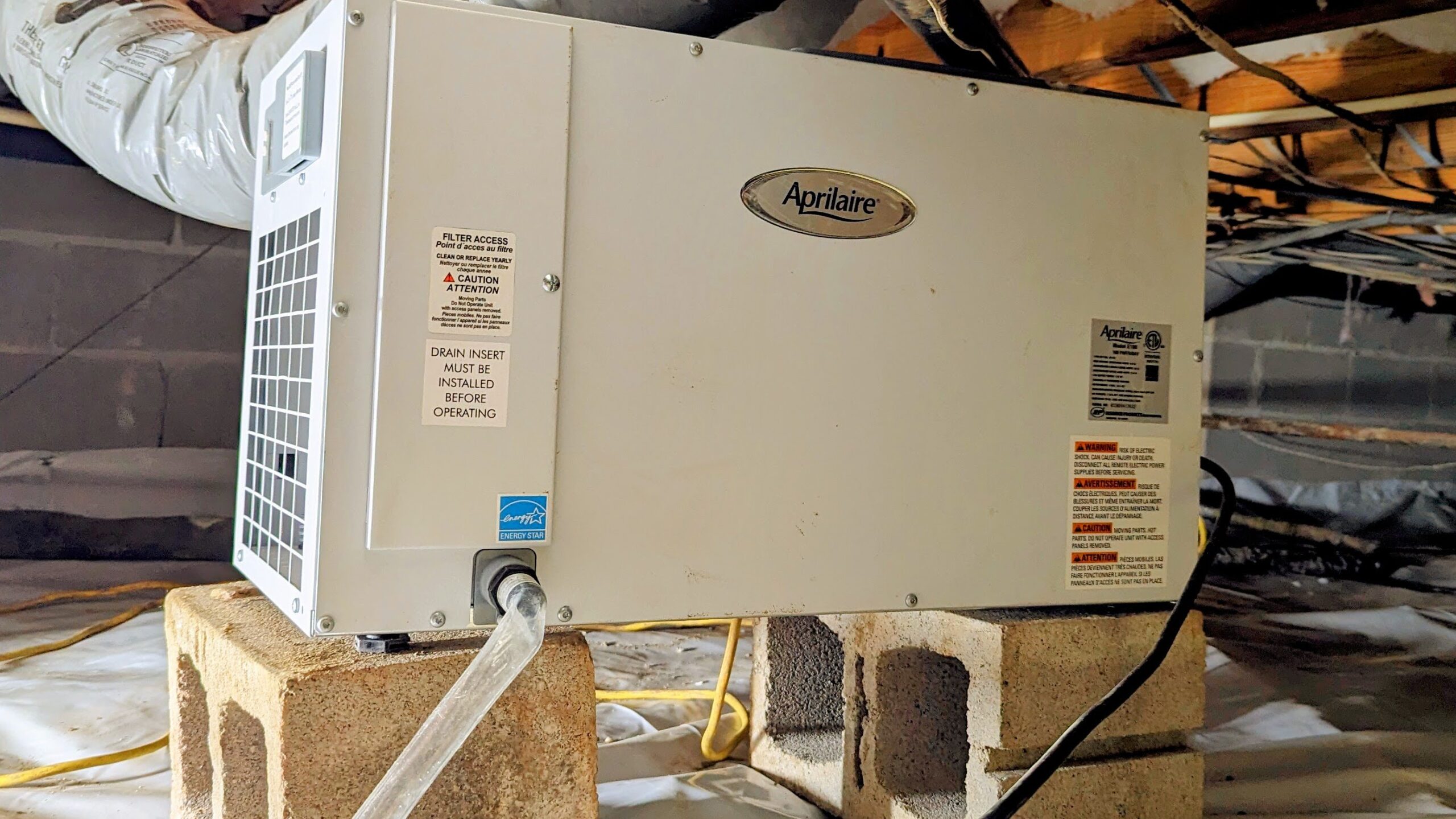A dehumidifier labeled 